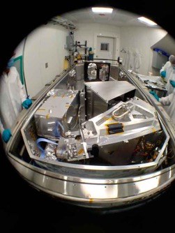 The NEID spectrograph being installed in the WIYN clean room
below the telescope. This photo was taken before the lid of the tank
sealed it up for operation. (Photo credit: National Optical-Infrared
Astronomy Research Laboratory/KPNO/AURA/NSF; Guðmundur Kári
Stefánsson; NEID Team/NOIRLab)